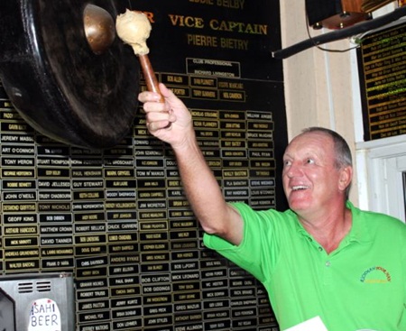 Bob Newell rings the bell after his fabulous golfing exploits at Green Valley.